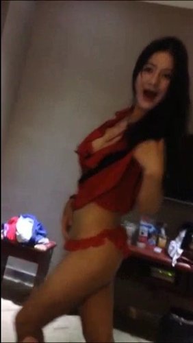 Pretty chinese girl in red fishnet lingerie fucking