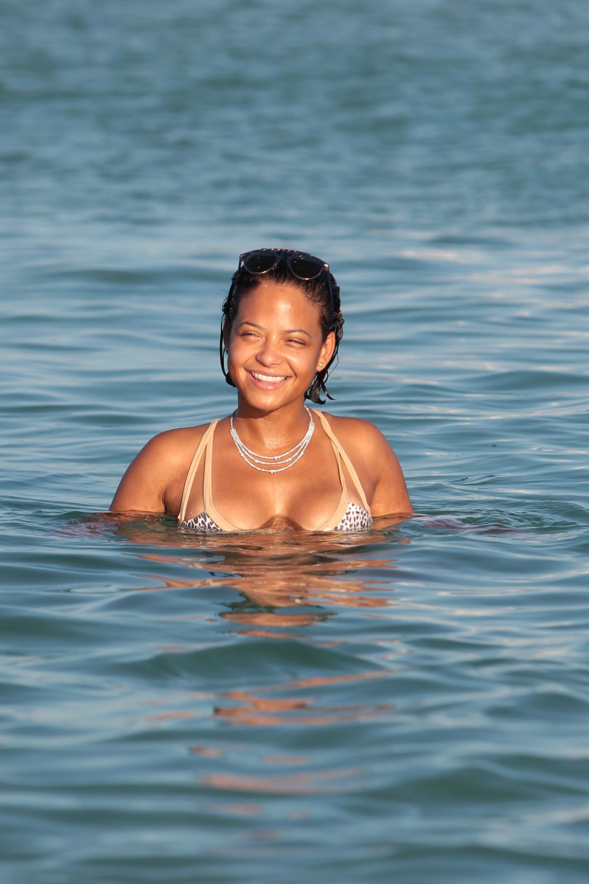 christina-milian-in-bikini-at-a-pool-in-miami-10-04-2015_19.jpg